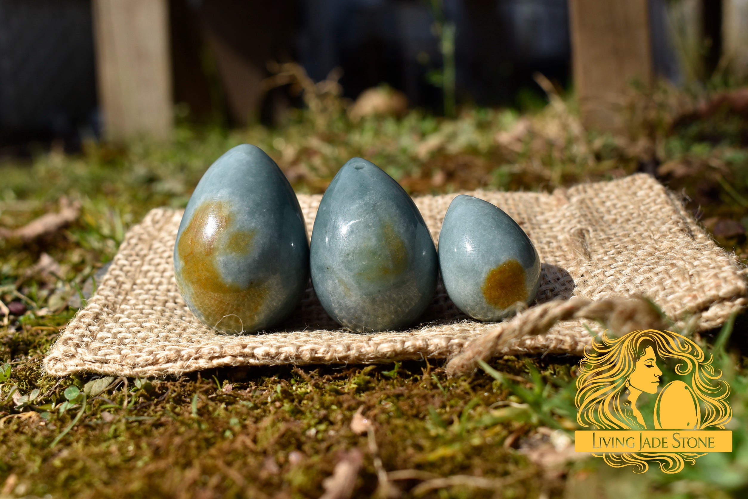 Light "Princesa" blue with orange crust jadeite jade yoni 3 egg set